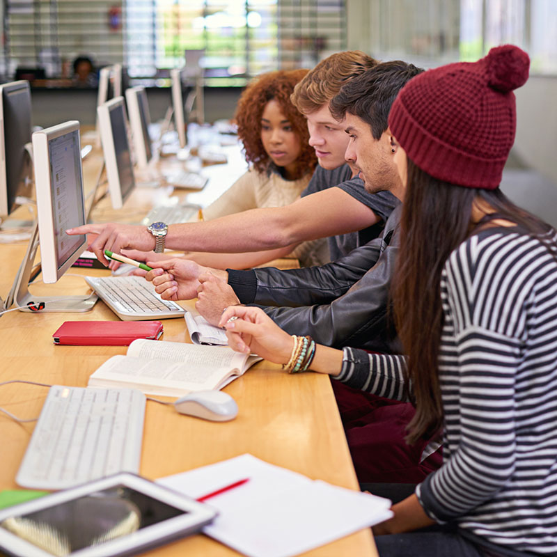 study-group-students-computer-library-education-assignment-academic-research-campus-college-university-learning-scholar-people-discussion-team-project-by-desktop